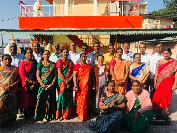 Close-up shot of clients with our local guide (Sunny) outside Yamunotri Dham temple, part of our 4 dham yatra package.
